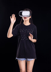 A young woman wearing VR goggles