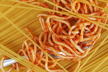 close-up spaghetti with tomato paste