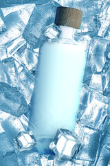 Bottle of vodka on ice cubes, top view