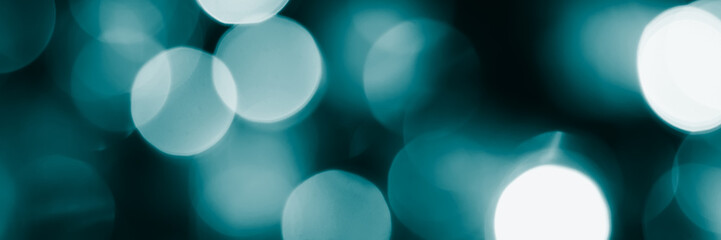Blurred lights, dark blue background, banner texture. Abstract bokeh with soft light header. Wide...