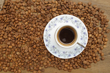 cup of coffee with beans