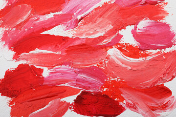 Beautiful strokes of bright oil paints on white canvas as background, closeup