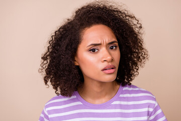 Photo of impressed confused lady wear violet t-shirt listening bad news isolated beige color background