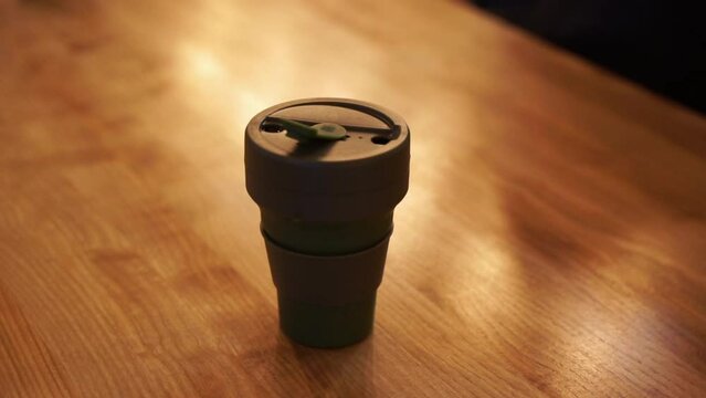 Eco-friendly glass for drinks to go. Green glass for coffee to go.