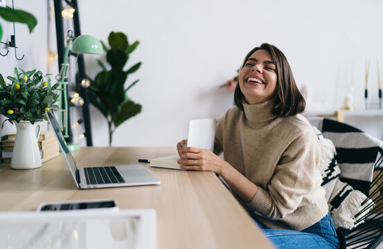 Woman working from home and having fun