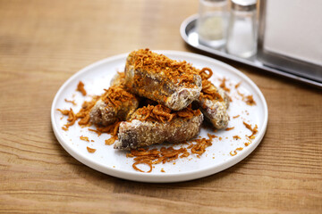 homemade Hunan style spicy pork spare ribs; vacuum cooking pork spare ribs in low temperature and then deep fried, finally sprinkle Hunan-style spices and serving.