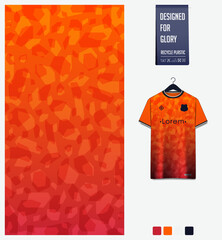 Soccer jersey pattern design. Mosaic pattern on orange background for soccer kit, football kit, sports uniform. T shirt mockup template. Fabric pattern. Abstract background. 