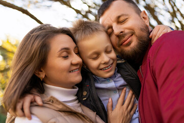 Fototapeta premium photographs of a happy traditional family close-up portrait of mom dad and baby boy