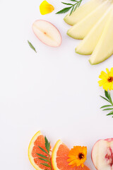 mock up. Ingredients for perfume. Fragrance design. Flat lay composition on a white background. Mango, red orange, peach, yellow flowers
