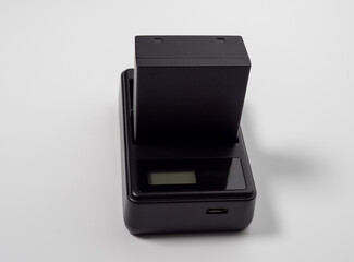 Battery for the camera on a white background.
