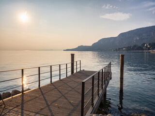 Pier on Lake Garda at sunset