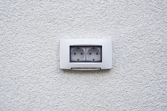 Detail View Of An Insulated Water Outlet Located On The Exterior Wall Of A House In The Yard. House Electronics Tools And Accessories.