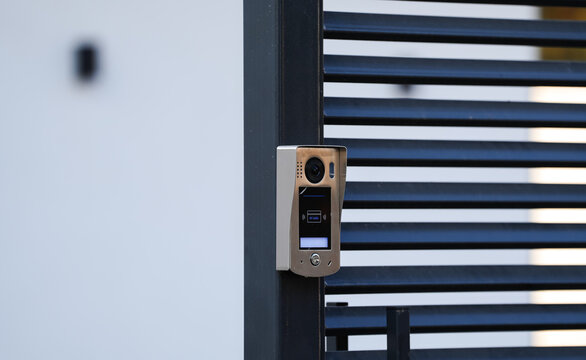 Intercom system for access to the house located on the entrance door to the yard. Home related safety access systems.