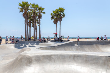 Venice Beach, Skaters in Skatepark , California. Venice Beach is one of most popular beaches of LA County.