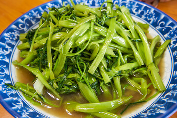 A delicious Chinese home-style dish, fried water spinach