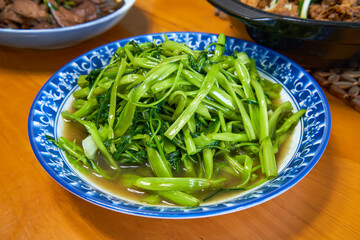 A delicious Chinese home-style dish, fried water spinach
