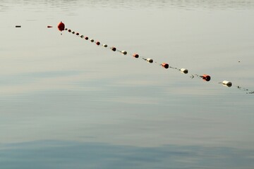 Fenced area of the water surface at the aqua farm