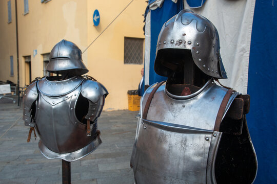 Historical re-enactments medieval weapons and armor appearing in medieval clothes