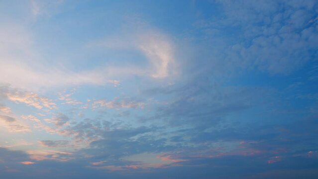 Colorful morning sky with cirrocumulus clouds. Beautiful sunny blue sky with cirrocumulus clouds. Timelapse.