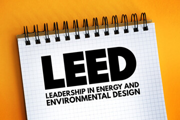 LEED - Leadership in Energy and Environmental Design acronym text on notepad, abbreviation concept...