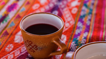 Andean design Ceramic cup with chicha morada