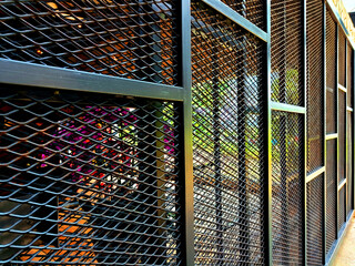 Fence of iron bars for room dividers retro modern style interiors. Retro Steel gate background.