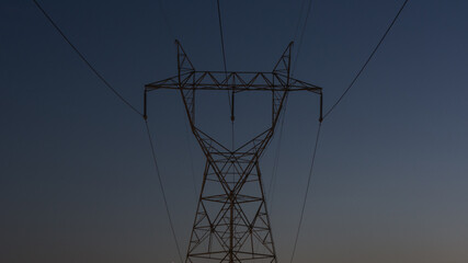 modern electric energy power grid at dusk night close-up