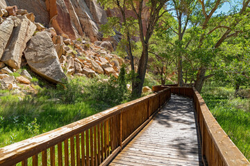 Fototapeta premium The boardwalk at the base of the canyon near the petroglyphs at Capitol Reef National Park, Utah, USA
