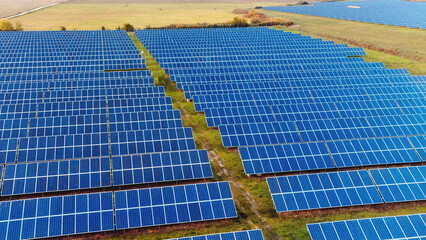 Fototapeta premium photovoltaic power plant. sunset and solar panel, photovoltaic, alternative electricity source