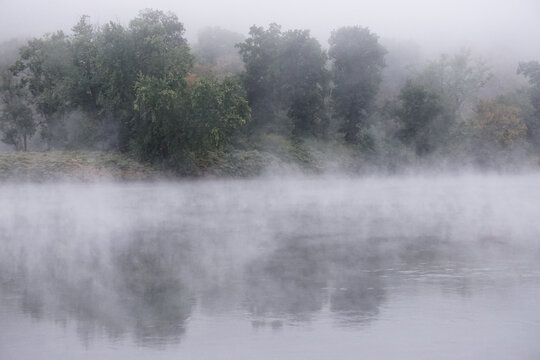 Shawnee on Delaware, Pennsylvania: Early morning mist rising from waters of the Delaware River, in the Delaware Water Gap. © Linda Harms