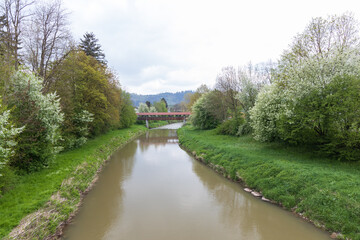 Fototapeta na wymiar Covered Bridge over the Kocher river in Gaildorf Germany