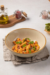 Portion of gourmet italian spiral pasta fusilli 