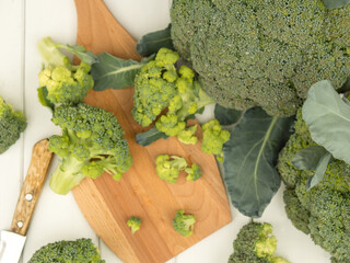 Lots of broccoli for diet and healthy eating. Fresh green broccoli on the table. Organic products