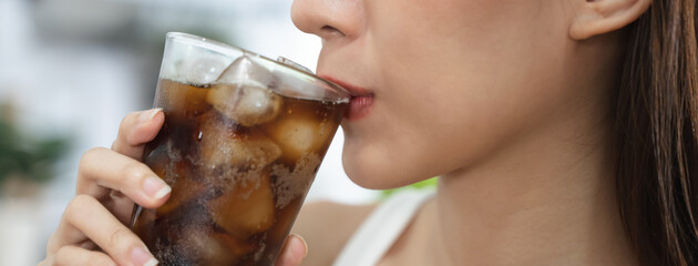 close up woman drinking soft dirnk cola