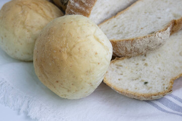 Mixed Bread in a basket on white background
