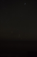 Orion the Hunter next to Pleiades 