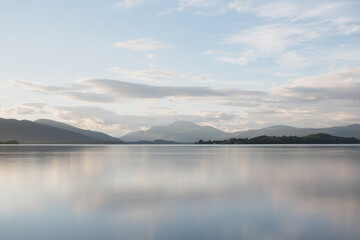 Beautiful daytime reflections on Loch Lomond of Ben Lomond