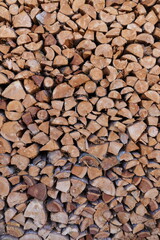 stacked dry firewood as a background