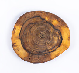 A cut of a tree. Annual rings on trees. Texture. On a white background