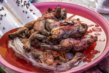 grilled chicken on a Thai market