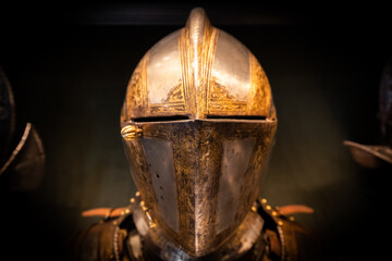 Antique armour on black background. Concept for security, safety and fantasy.