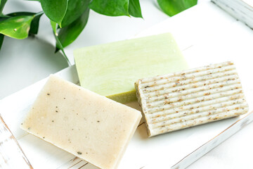 Homemade soap concept closeup, organic handmade soap with oils, herbal ngredients, spa and skin care concept