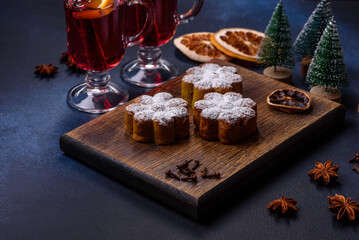 Hot mulled wine with a slice of orange, with cinnamon, cloves and other spices