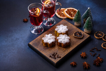 Hot mulled wine with a slice of orange, with cinnamon, cloves and other spices