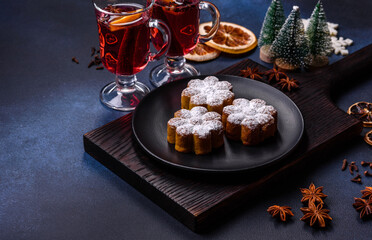 Hot mulled wine with a slice of orange, with cinnamon, cloves and other spices