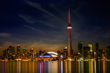 Toronto skyline or cityscape at night. Signs and logos have been removed.
