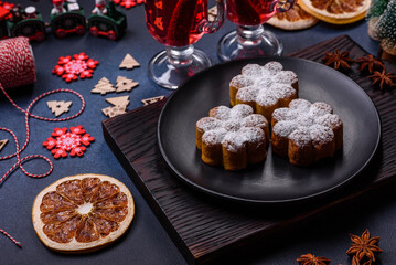 Hot mulled wine with a slice of orange, with cinnamon, cloves and other spices