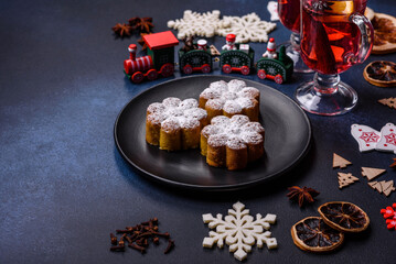Hot mulled wine with a slice of orange, with cinnamon, cloves and other spices