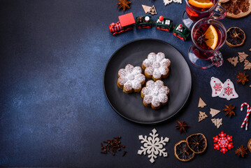 Hot mulled wine with a slice of orange, with cinnamon, cloves and other spices