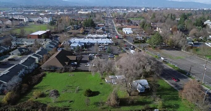 Sweeping drone shot overlooking city of Medford, Oregon.